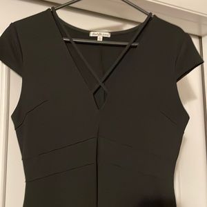 Black midi dress. Hits right at the knees or just below